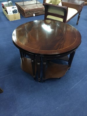 Lot 335 - A MAHOGANY CIRCULAR NEST OF FOUR TABLES