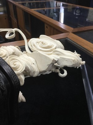 Lot 1001 - AN EARLY 20TH CENTURY CHINESE IVORY CARVING OF ZHINU