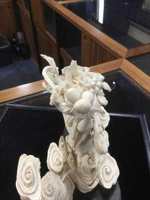 Lot 1001 - AN EARLY 20TH CENTURY CHINESE IVORY CARVING OF ZHINU