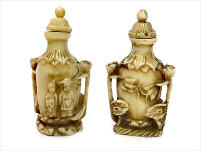 Lot 1187 - A PAIR OF EARLY 20TH CENTURY CHINESE IVORY SNUFF BOTTLES