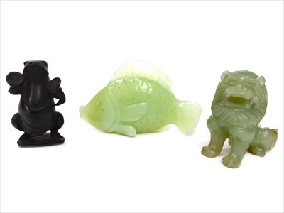 Lot 1194 - A CHINESE GREEN HARDSTONE MODEL OF A LION, A FISH AND A FROG