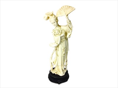 Lot 1198 - AN EARLY 20TH CENTURY CHINESE IVORY CARVING OF A FEMALE
