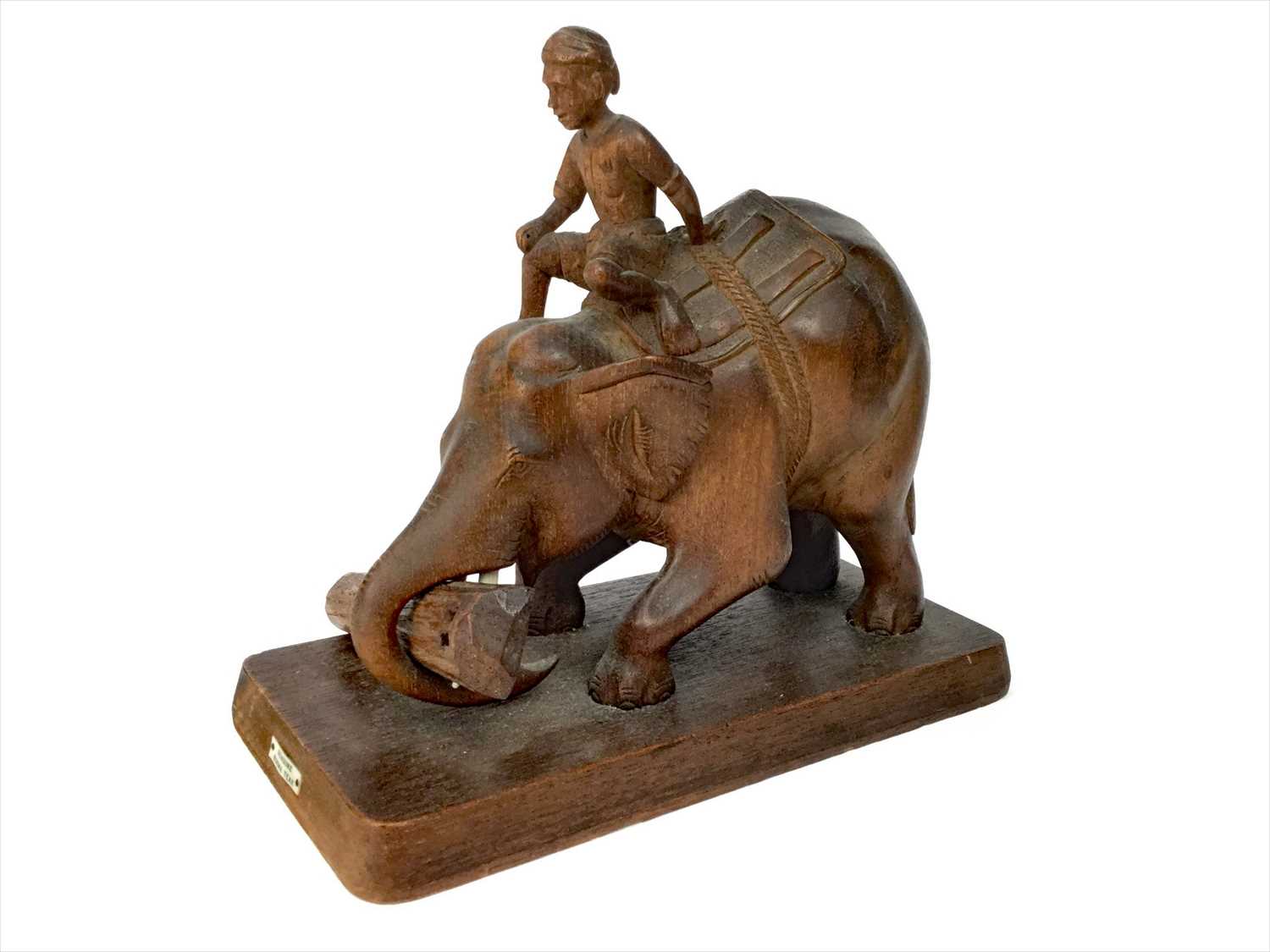 Lot 1199 - A BURMESE CARVED TEAK MODEL OF AN ELEPHANT AND RIDER