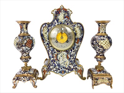Lot 1152 - A VICTORIAN BRASS AND ENAMEL CLOCK GARNITURE