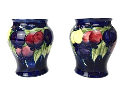 Lot 1336 - A PAIR OF MOORCROFT VASES