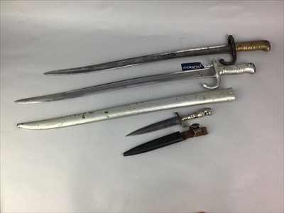 Lot 62 - A TWO EARLY 20TH CENTURY BAYONETTES ALONG WITH A DAGGER