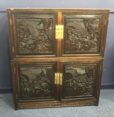 Lot 1127 - A 20TH CENTURY CHINESE CARVED WOOD FOUR DOOR CABINET
