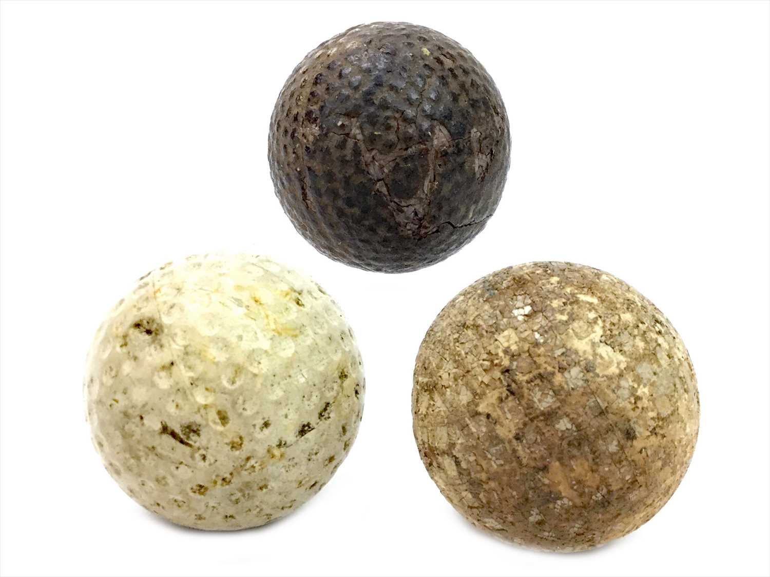 Lot 1728 - AN LATE 19TH/EARLY 20TH CENTURY HASKELL TYPE GOLF BALL ALONG WITH TWO OTHERS
