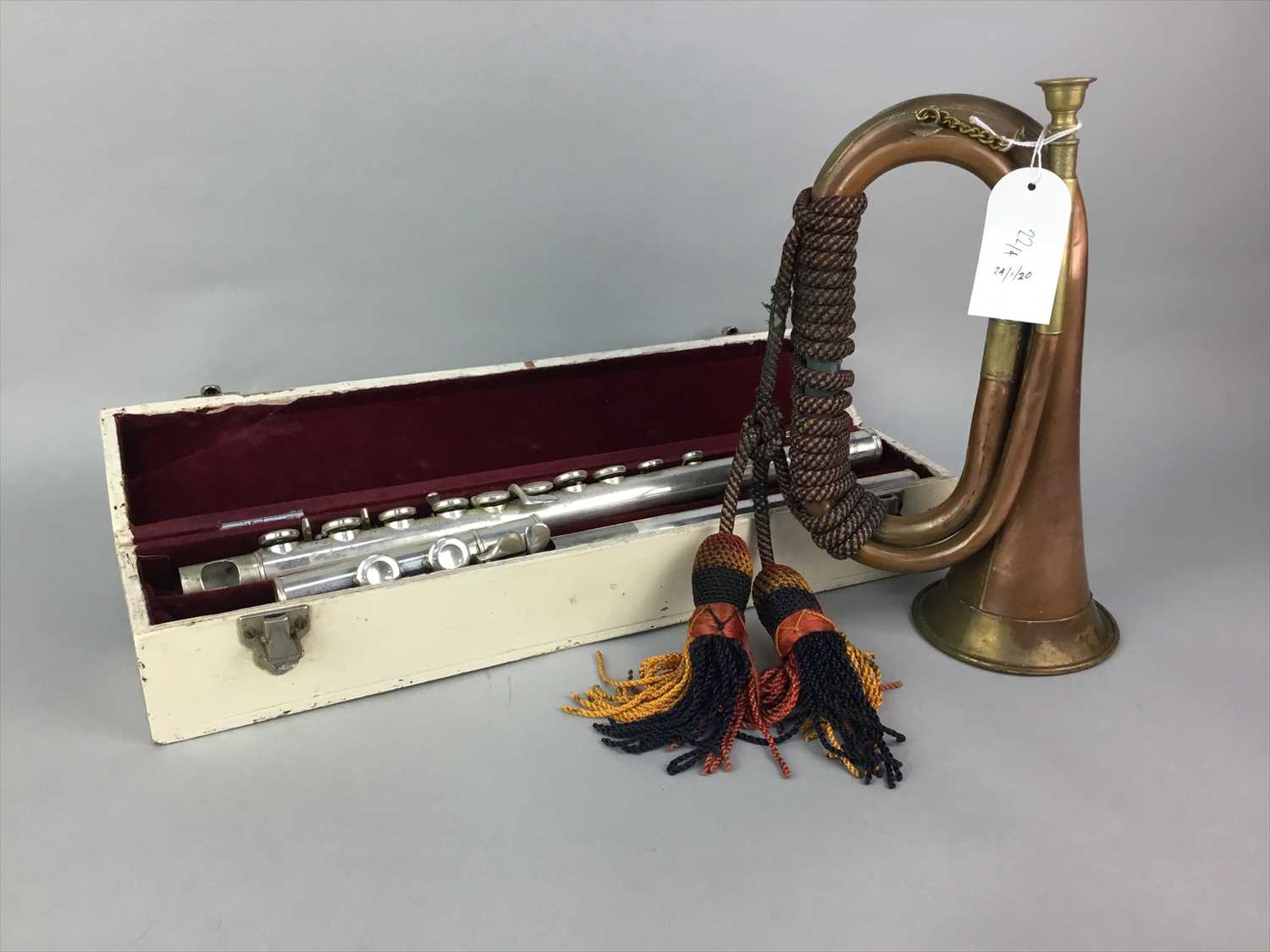 Lot 22 - A COPPER AND BRASS BUGLE, FLUTE, SHEET MUSIC AND A METRONOME