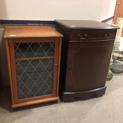 Lot 264 - A MAHOGANY BOWFRONTED SIDE CABINET AND A STEREO CABINET
