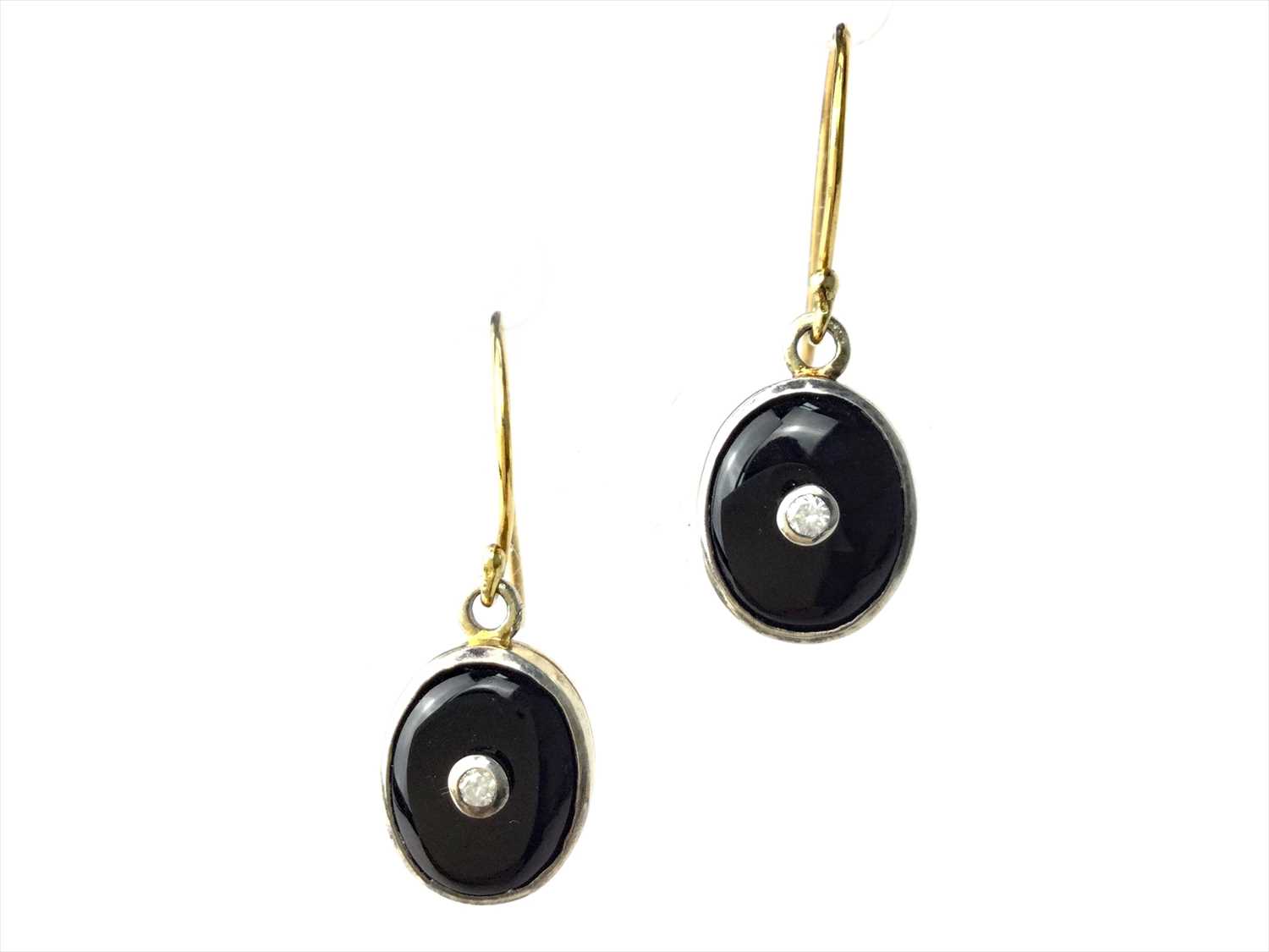 Lot 320 - A PAIR OF ONYX AND DIAMOND EARRINGS