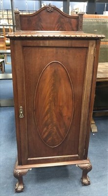 Lot 196 - A MAHOGANY MUSIC CABINET OF CHIPPENDALE DESIGN