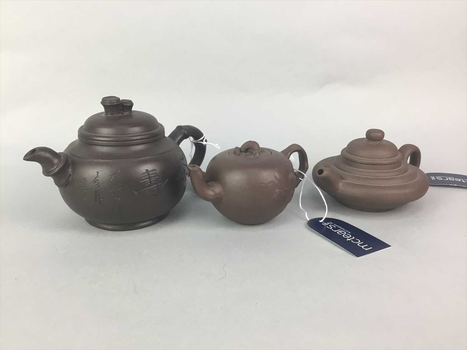 Lot 102 - A LOT OF CHINESE YI XING TEA POTS