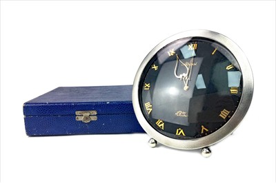 Lot 1157 - AN ABESSI SILVER MANTEL CLOCK IN BOX
