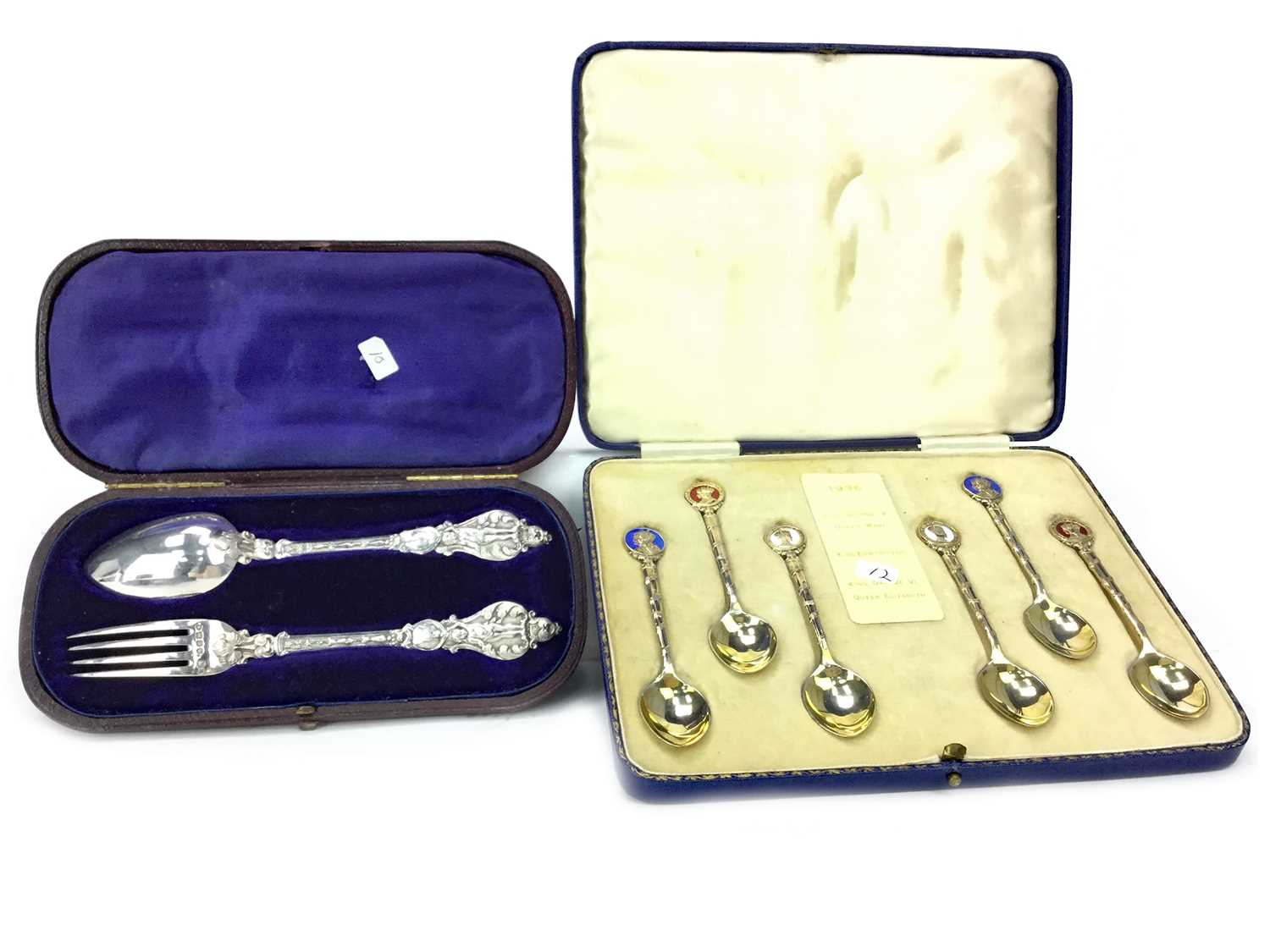 Lot 411 - A CHRISTENING FORK AND SPOON SET AND A SET OF SIX SILVER GILT SPOONS