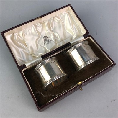 Lot 198 - A PAIR OF SILVER NAPKIN RINGS IN A FITTED CASE
