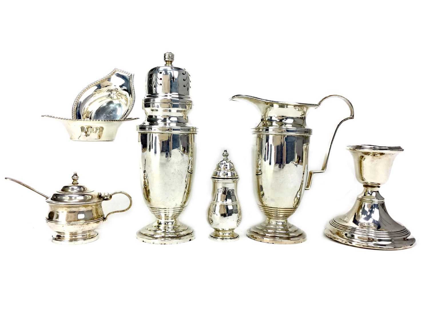 Lot 417 - A SILVER SUGAR CASTER, A CREAMER, TWO SALTS, PEPPERETTE, MUSTARD POT, AND CANDLESTICK