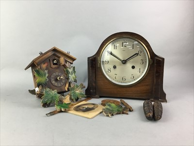 Lot 106 - AN EARLY 20TH CENTURY OAK CASED MANTEL CLOCK ALONG WITH A CUCKOO CLOCK AND A TABLE LAMP