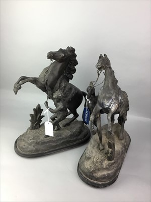Lot 185 - A PAIR OF SPELTER MARLEY HORSE GROUPS