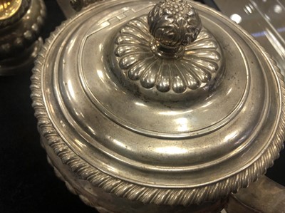 Lot 418 - A GEORGE III SILVER TEAPOT AND CREAMER