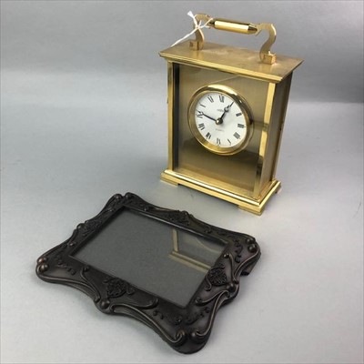 Lot 224 - A MANTEL CLOCK AND A PHOTOGRAPH FRAME