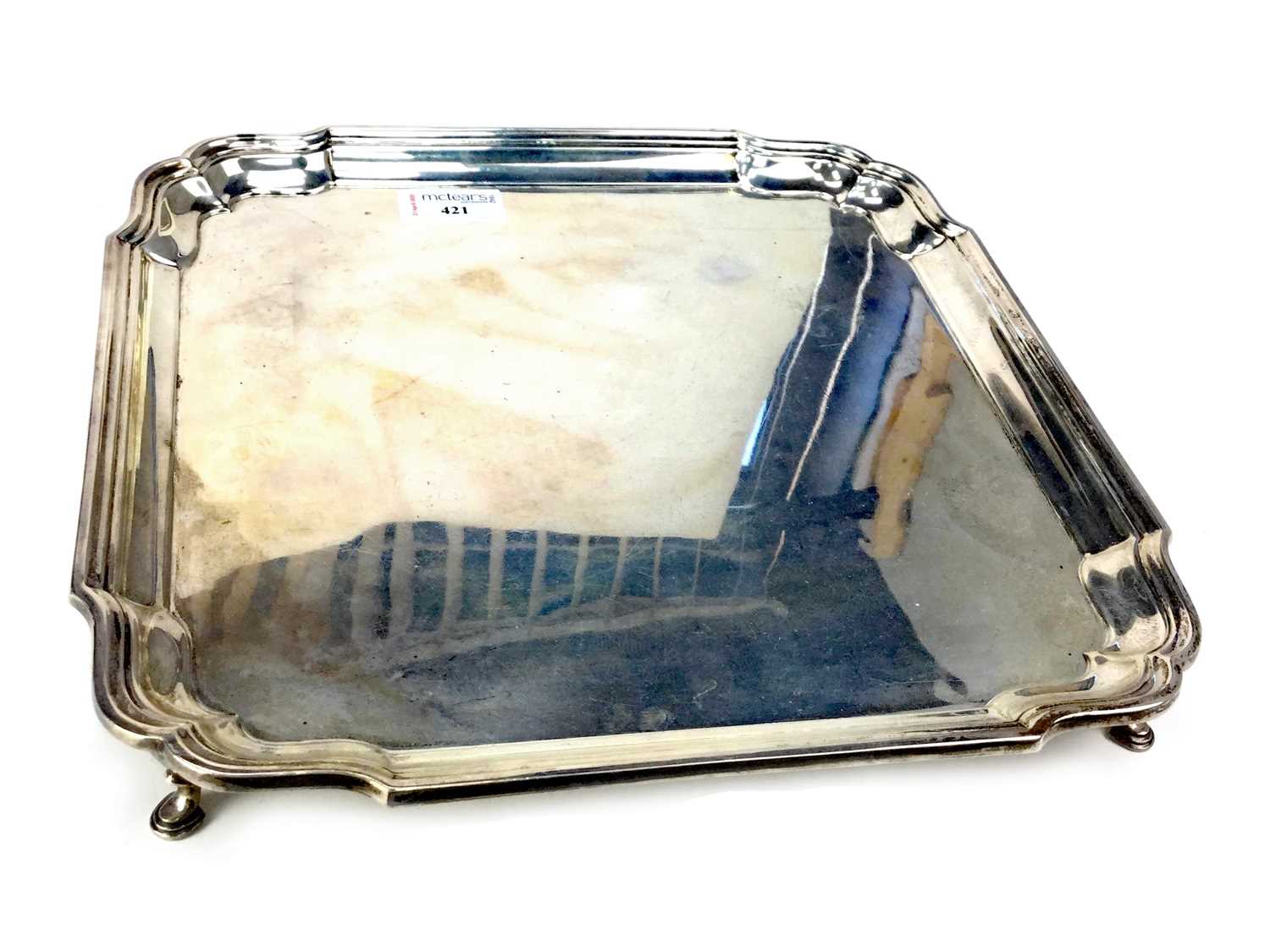 Lot 421 - AN EARLY 20TH CENTURY SILVER SALVER