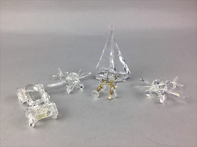Lot 253 - A LOT OF SWAROVSKI CRYSTAL VEHICLES INCLUDING TWO PLANES AND A SAILBOAT