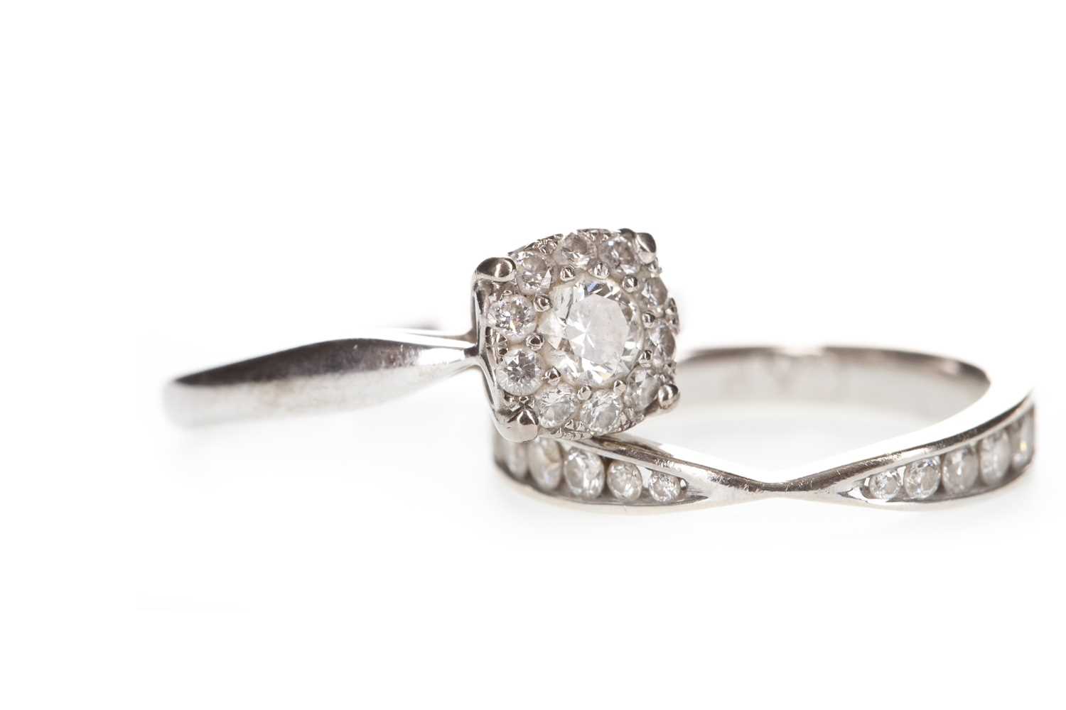 Lot 336 - A DIAMOND CLUSTER RING AND A DIAMOND SET BAND