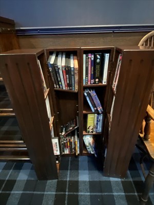Lot 308 - A FOLDING DVD CABINET AND A COLLECTION OF DVDS