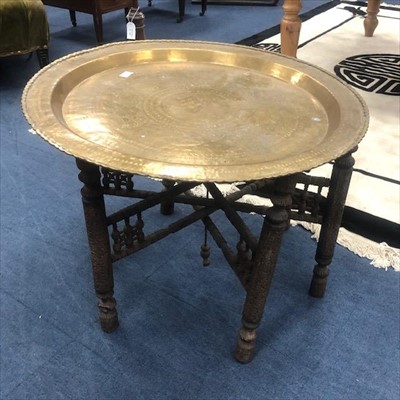 Lot 343 - A BRASS TOPPED COFFEE TABLE ON FOLDING STAND
