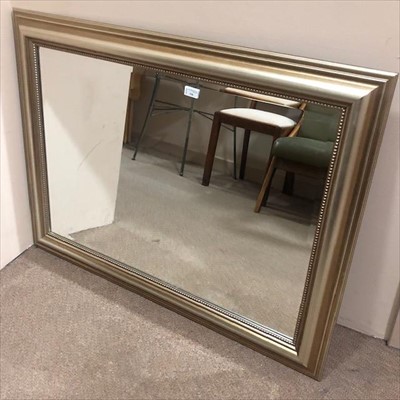 Lot 336 - A BEVELLED WALL MIRROR