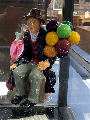 Lot 340 - A ROYAL DOULTON FIGURE OF 'THE BALLOON MAN' AND THREE OTHER ROYAL DOULTON FIGURES