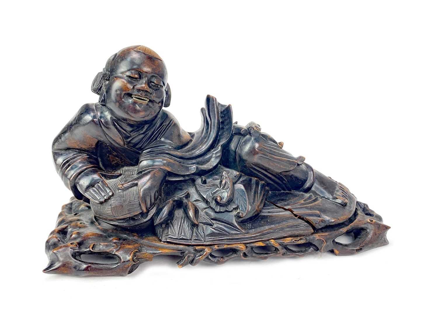 Lot 721 - A CHINESE CARVED WOOD FIGURE