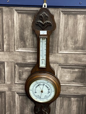 Lot 367 - A 20TH CENTURY STAINED WOOD WALL BAROMETER