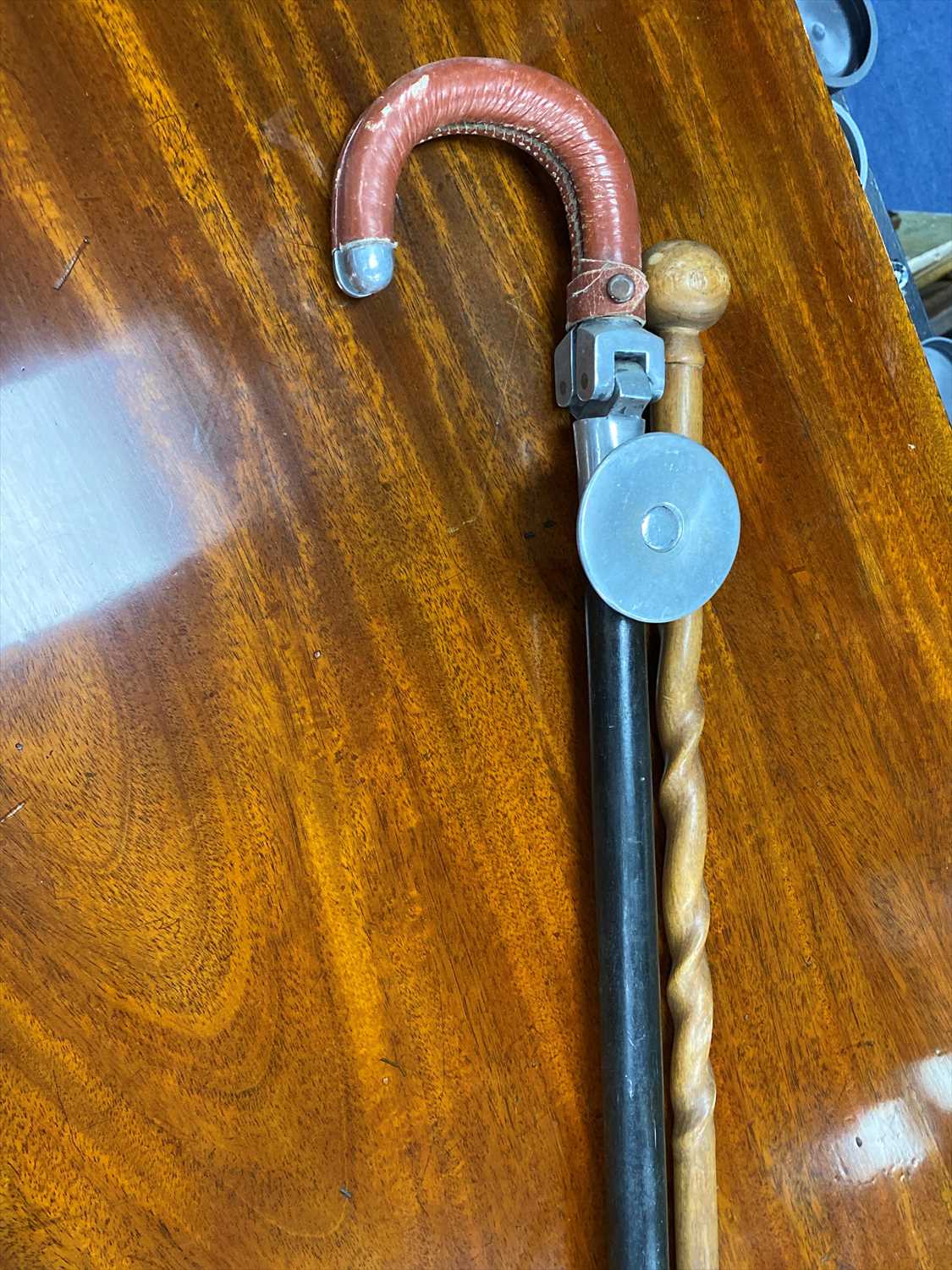 Lot 434 - A SHOOTING STICK AND A WALKING CANE