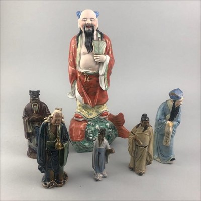 Lot 76 - A CHINESE STANDING FIGURE