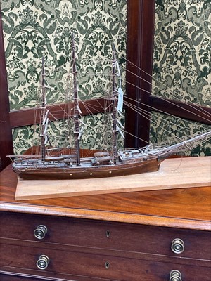 Lot 370 - A DECORATIVE MODEL BOAT ON STAND