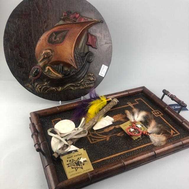 Lot 21 - A POKERWORK TRAY, PLAQUE AND AMERICAN ARTEFACTS