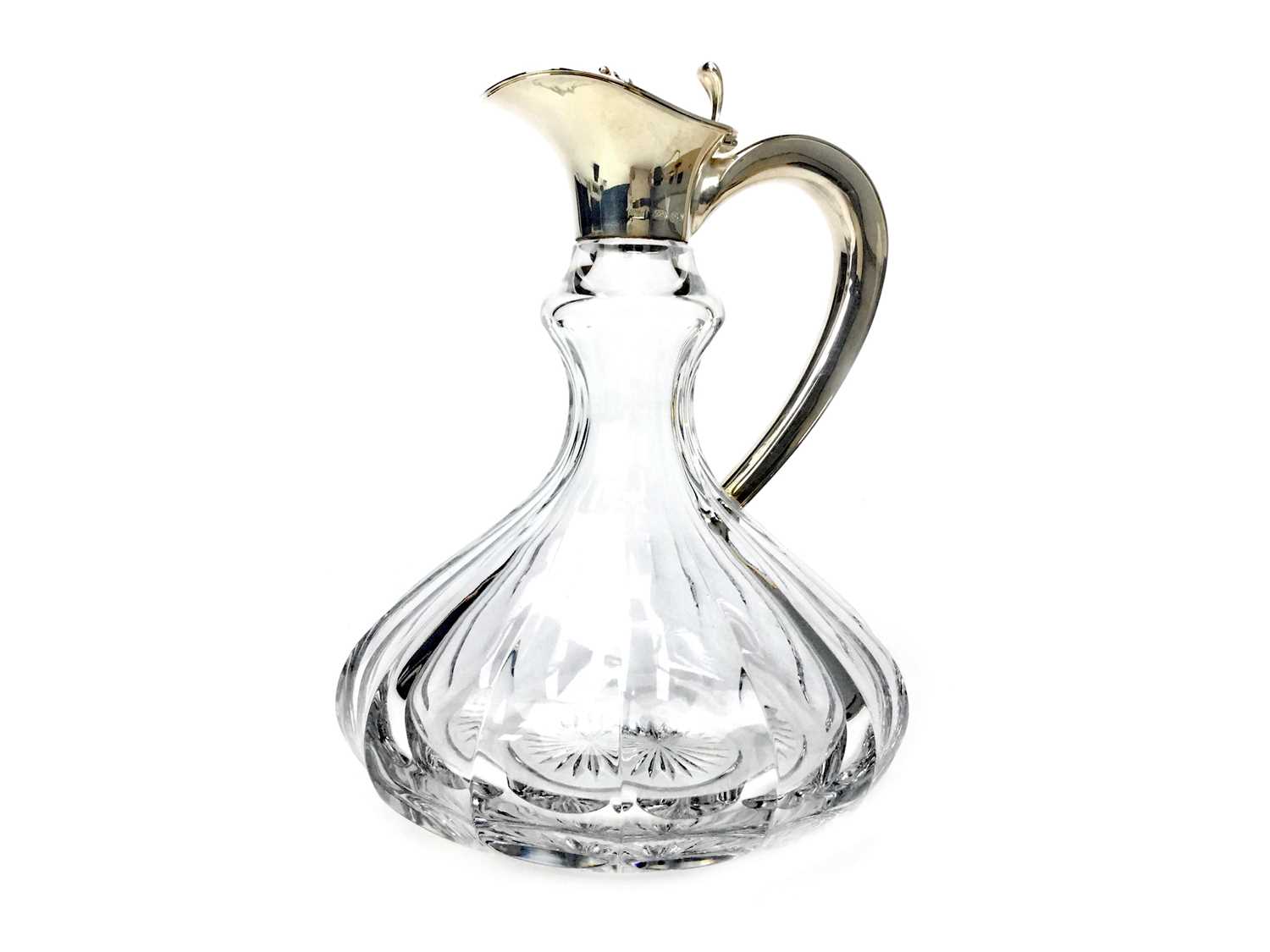Lot 426 - A SILVER MOUNTED CLARET JUG