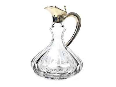 Lot 426 - A SILVER MOUNTED CLARET JUG
