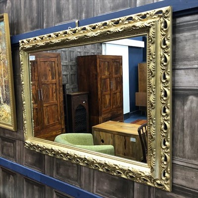 Lot 219 - A DECORATIVE WALL MIRROR