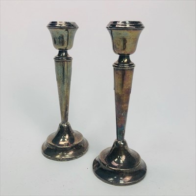 Lot 125 - A PAIR OF SILVER CANDLESTICKS