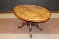 Lot 1043 - VICTORIAN WALNUT CROSSBANDED OVAL TIP UP TABLE...