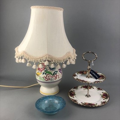 Lot 32 - A POOLE POTTERY FLORAL DECORATED TABLE LAMP ALONG WITH A MONART DISH AND A CAKE STAND