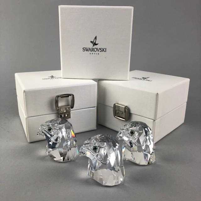 Lot 159 - A LOT OF THREE SWAROVSKI CRYSTAL FALCON HEADS