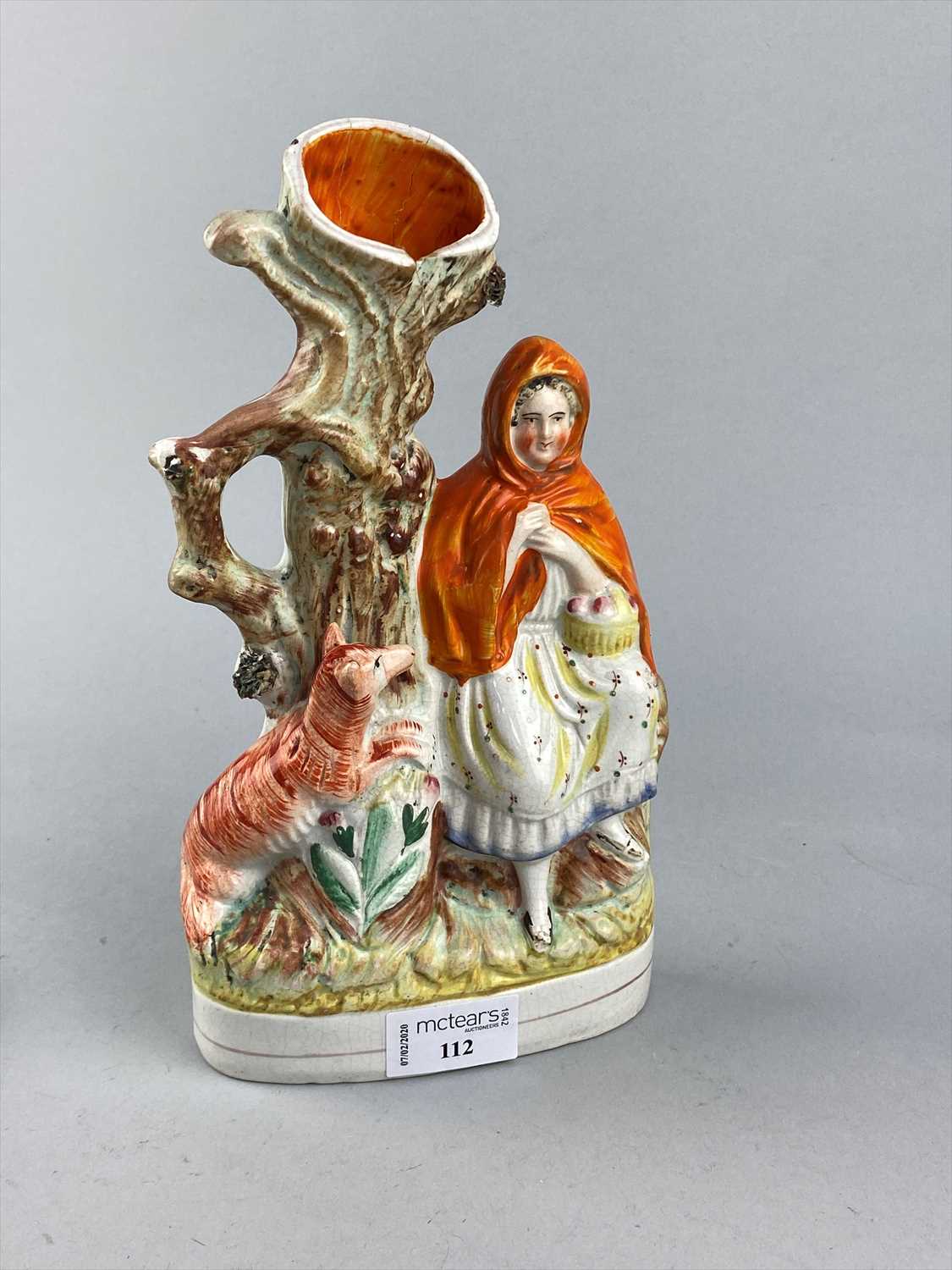 Lot 112 - A STAFFORDSHIRE SPILL HOLDER AND OTHER FIGURES