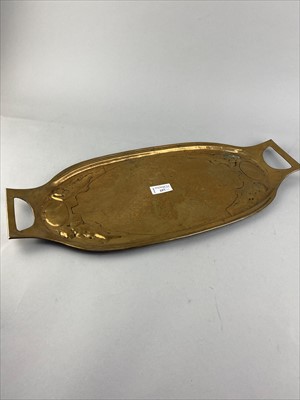 Lot 257 - AN EMBOSSED AND HAMMERED BRASS TRAY, WOOD TRAY AND NUT DISH