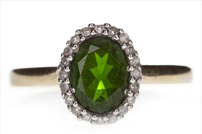 Lot 392 - A GREEN GEM AND DIAMOND RING