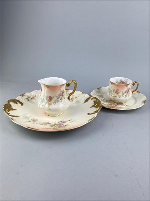 Lot 278 - A LIMOGES FLORAL AND GILT PART TEA SERVICE