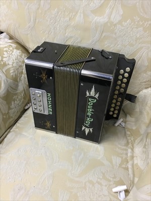 Lot 455 - A HOHNER DOUBLE-RAY ACCORDIAN, SHEET MUSIC AND A HAT BOX